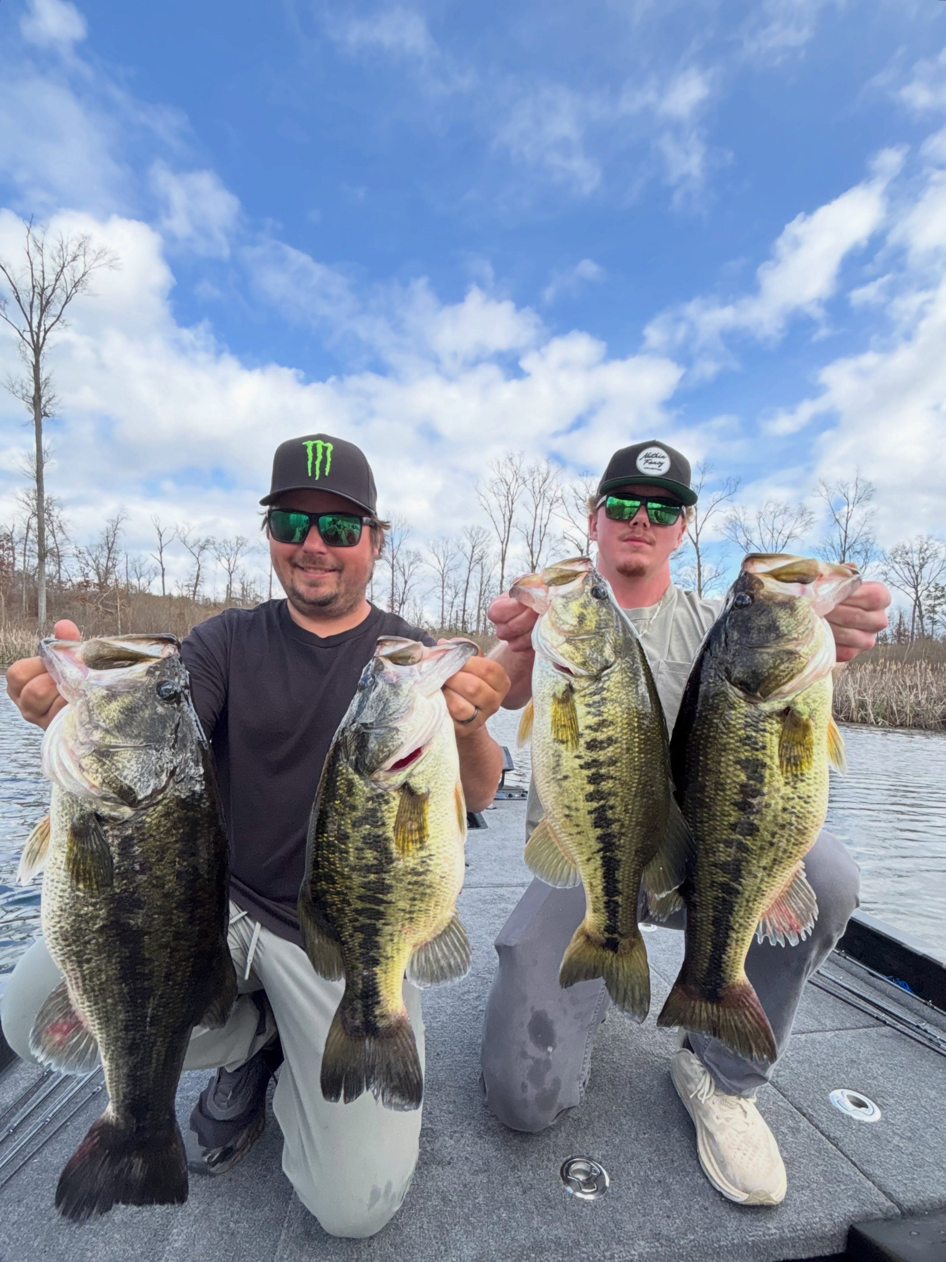 Two anglers with a limit of trophy bass